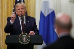 President Donald Trump speaks during a news conference with and Finnish President Sauli Niinisto (not pictured) at the White House in Washington, Oct. 2, 2019.
