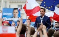 Warsaw mayor Rafal Trzaskowski, presidential candidate of the main opposition center-right Civic Platform (PO) party, pauses during his election event in Warsaw, Poland, June 26, 2020.