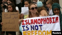 Protesters demonstrate against France's ban of the burkini, outside the French Embassy in London, Britain, August 25, 2016.