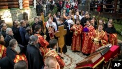 FILE - Russian Orthodox Church Patriarch Kirill leads a religious service honoring Czar Nicholas II July 17, 2018. Recently, Patriarch Kirill recognized the independence of Ukraine's church from Russia's. (AP Photo/Aleksandr Abramenkov)