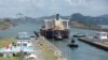FILE - A bulk carrier moves through the Cocoli Locks at the Panama Canal, on the outskirts of Panama City, April 19, 2023. 