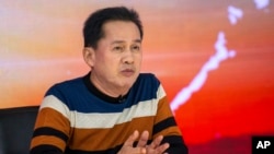 FILE - Apollo Carreon Quiboloy appears on his talk show on May 23, 2016, in Davao City, southern Philippines. Quiboloy, the leader of the Philippines-based Kingdom of Jesus Christ church, was charged by US prosecutors with sex-trafficking Nov. 17, 2021.
