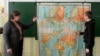FILE - A teacher leads a history lesson for seventh graders in the Russian village of Bolshie Khutora, about 440 km west of Moscow.