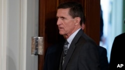 Mike Flynn arrives for a news conference in the East Room of the White House in Washington, Feb. 13, 2017.