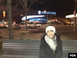 Annisa enjoying an overnight trip to New York - one way to see the country, but also to increase expenses.