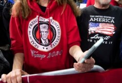 Supporters attend a US President Donald Trump "Keep America Great" campaign rally in Milwaukee, Wisconsin, January 14, 2020. (Photo by SAUL LOEB / AFP)