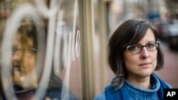 Kate Young, a Democrat who voted for Hillary Clinton, poses in West Chester, Pennsylvania, Jan. 4, 2017. The 2016 election compelled Young to become politically active for the first time.
