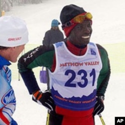 Philip Boit chats with a fan after the race