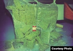 កញ្ឆា​របស់​ថៃ​នៅ​ទីក្រុង​បាងកក កាល​ពី​ទសវត្សរ៍​ឆ្នាំ​១៩៧០។ (រូបថត​ដោយ Mike Ferguson)