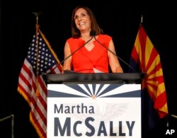 U.S. senatorial candidate and U.S. Rep. Martha McSally, R-Ariz., celebrates her primary election victory in Tempe, Ariz., Aug. 28, 2018.
