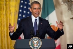 President Barack Obama answers questions during a joint news conference with Mexican President Enrique Pena Nieto in the East Room of the White House in Washington, July 22, 2016.