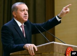FILE - Turkish President Recep Tayyip Erdogan speaks during an event for foreign investors in Ankara, Aug. 2, 2016. He again blasted Western countries that he says supported an attempted coup on July 15.