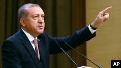 Turkish President Recep Tayyip Erdogan speaks during an event for foreign investors in Ankara, Aug. 2, 2016. He again blasted unnamed Western countries that he says supported an attempted coup on July 15.