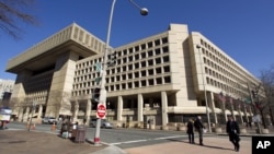 FILE - The Federal Bureau of Investigation headquarters in Washington.