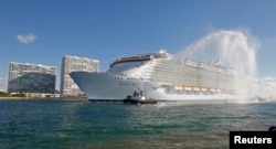 FILE - Royal Caribbean International's cruise ship 'Allure of the Seas' enters its new home port in Fort Lauderdale as seen from nearby Hollywood, Florida, Nov. 11, 2010.