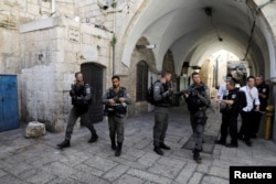 Israeli border police secure the area near the scene of the shooting attack in Jerusalem's Old City, July 14, 2017.