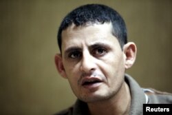 Saad Khalaf Ali, one of the 69 hostages rescued from an Islamic State prison in a joint raid by U.S. and Kurdish special forces, speaks during an interview with Reuters in Irbil, Iraq, Oct. 29, 2015.