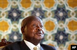FILE - Ugandan President Yoweri Museveni speaks to reporters at the Akasaka Palace state guesthouse in Tokyo, Sept. 12, 2015.