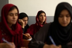 Girls attend lessons at their orphanage in Kabul, Afghanistan, October 10, 2021. REUTERS/Jorge Silva