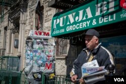 Veteran taxi driver Nahinder Behl says he works longer hours for less money these days and didn't have enough money to pay this month’s rent. (R. Taylor/VOA)