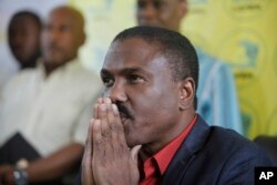 FILE - Presidential candidate Jude Celestin gives a news conference, Nov. 6, 2015, in Port-au-Prince, Haiti.