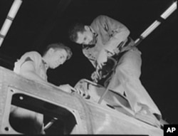 By World War II, when this photo was taken, blacks and whites were accustomed to working side by side in northern factories.