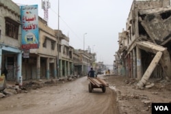 Residents of the worst-hit areas IS once controlled in Iraq say they are largely on their own to rebuild, Nov. 27, 2018, in Mosul. (H.Murdock/VOA)