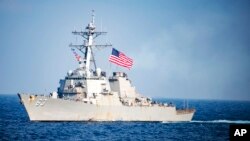 FILE - U.S. Navy destroyer USS Stethem transits waters east of the Korean Peninsula during a photo exercise including the U.S. Navy and South Korean Navy during the Operation Foal Eagle.