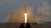 Soyuz Capsule Docks With International Space Station
