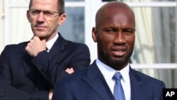 Didier Drogba au Palais de l'Elysée, à Paris, France, mercredi 21 février 2018. (Stephane Mahe, pool photo via AP)