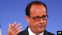 Presiden Perancis Francois Hollande saat menyampaikan pesan kepada para duta besar Perancis di Paris, 30 Agustus 2016 (AP Photo/Francois Mori, Pool).