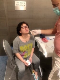 Dunnapar "Fern" Tilakamonkul, a UNHCR staff, had to do a health check and spend 14 days in quarantine after arriving in Iraq.