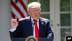 President Donald Trump speaks about the U.S. role in the Paris climate change accord, June 1, 2017.