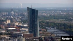 FILE - The construction site of the new headquarters of the European Central Bank (ECB) is seen from the observation deck of the "Maintower" in Frankfurt, April 25, 2014. 