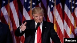 U.S. President-elect Donald Trump greets supporters during his election night rally in Manhattan, New York, Nov. 9, 2016.