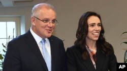 New Zealand's Prime Minister Jacinda Ardern, right, and Australian Prime Minister Scott Morrison in Melbourne, Australia, July 19, 2019. Their countries are tackling online extremism and the threat of radicalization on the internet.