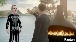 Facebook CEO Mark Zuckerberg speaks to an avatar of himself in the "Metaverse" during a live-streamed virtual and augmented reality conference to announce the rebrand of Facebook as Meta, in this screen grab taken from a video released October 28, 2021. 