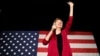 Sen. Elizabeth Warren, D-Mass, waves to the crowd during an organizing event at Curate event space in Des Moines, Iowa, Jan. 5, 2019.