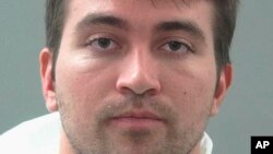 FILE - This undated photo provided by the Weber County Sheriff's Office shows Aaron Shamo, 27, who was arrested at his home in Cottonwood Heights, Utah and charged with running a multimillion-dollar opioid drug ring.