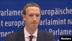 Facebook's CEO Mark Zuckerberg answers questions about the improper use of millions of users' data by a political consultancy, at the European Parliament in Brussels, Belgium, in this still image taken from Reuters TV, May 22, 2018.