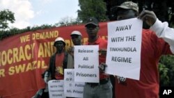 People demonstrate outside the Embassy of Swaziland in Pretoria on April 12, 2011 to support planned protests against the rule of King Mswati III