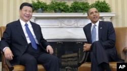 President Barack Obama meets with Chinese Vice President Xi Jinping, February, 14, 2012, in the Oval Office of the White House in Washington.