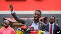 FILE - Ugandan opposition figure Robert Kyagulanyi, better known as Bobi Wine, speaks at a press conference in Kampala, Uganda, Feb. 22, 2021. 