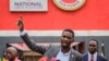 FILE - Ugandan opposition figure Robert Kyagulanyi, better known as Bobi Wine, speaks at a press conference in Kampala, Uganda, Feb. 22, 2021. 