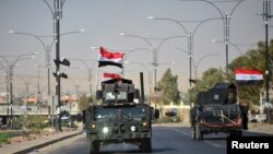 កងកម្លាំង​អ៊ីរ៉ាក់​សម្រុក​ចូល​ក្នុង​ក្រុង Kirkuk ប្រទេស​អ៊ីរ៉ាក់ កាលពី​ថ្ងៃទី១៦ ខែតុលា ឆ្នាំ២០១៧។