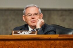 FILE - Sen. Robert Menendez, D-N.J., speaks on Capitol Hill, Jan. 27, 2021.