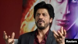 Bollywood actor Shah Rukh Khan speaks during an interview with Reuters at Madame Tussauds in London, April 13, 2016.