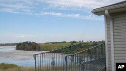 This former nursing home - which was purchased by FirstEnergy Corporation for the company’s proposed expansion project - overlooks the Little Blue Run waste ash dump. The chemicals give it a blue tint.