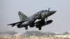 France flies 2 fighter jets from Chad to signal start of military withdrawal