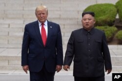 도널드 트럼프 당시 미국 대통령과 김정은 북한 국방위원장이 지난 2019년 6월 판문점에서 만났다.